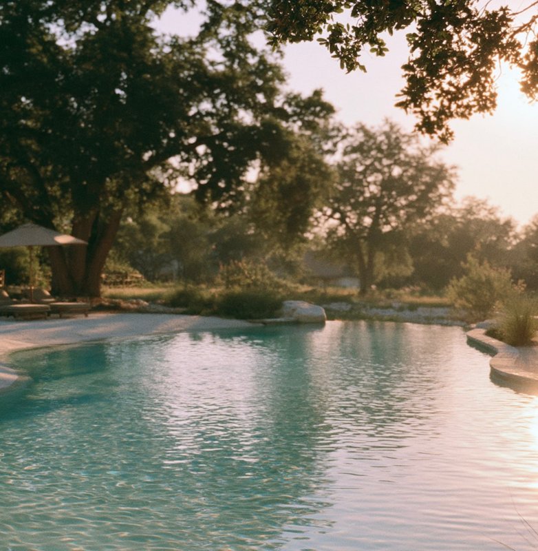 A freeform pool with a natural stone edge
